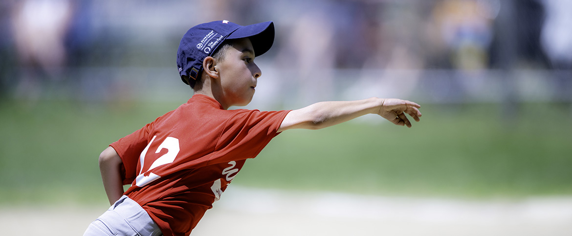 Jimmy Fund Little Leaguer throws a pitch