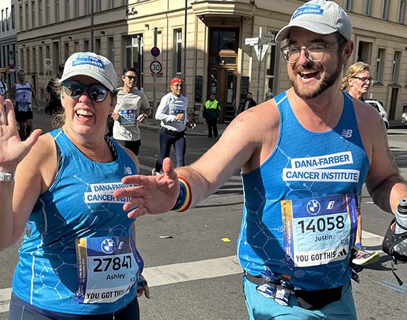 Two people participating in the Berlin Marathon for Dana-Farber