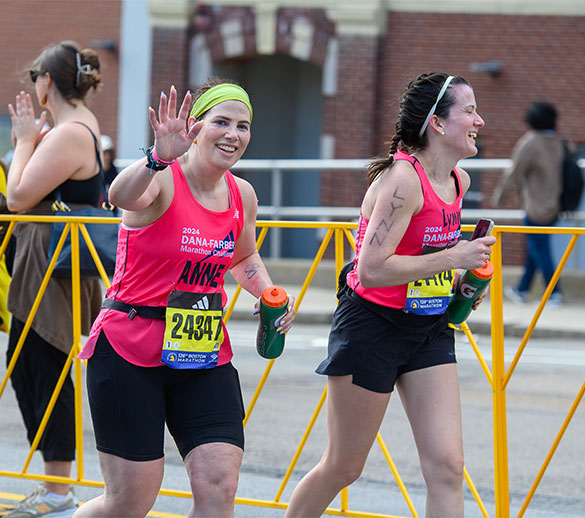 Two Dana-Farber Marathon Challenge runners during the race