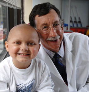 Dr. Stephen E. Sallan, next to a Dana-Farber Jimmy Fund patient