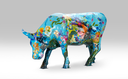 Colorful cow facing left