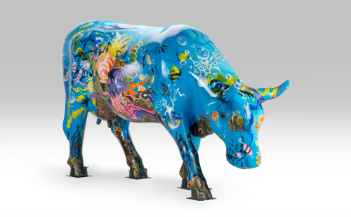 Colorful cow facing right