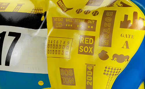 Yellow and blue Boston Red Sox City Connect cow close-up