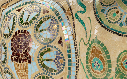 Glass and ceramic mosaic cow close-up