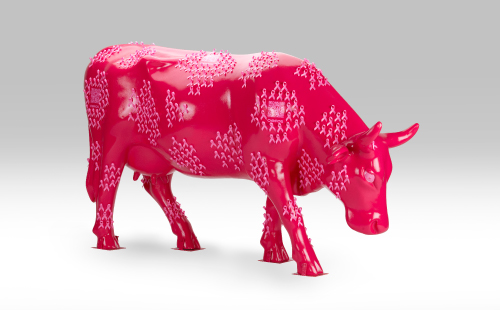 Pink cow with breast cancer ribbons facing right