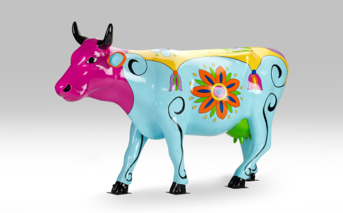 Colorful floral cow facing left