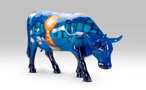 Cow with beacon of hope design facing right