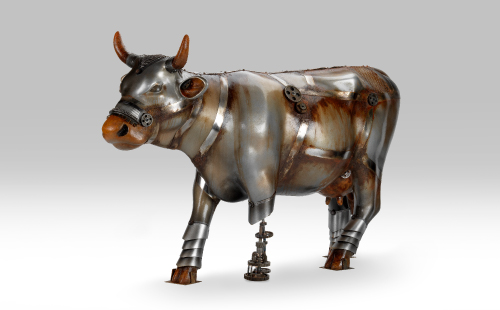 Metal and armor inspired cow facing left