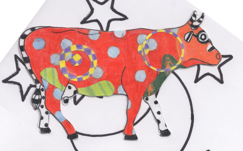 Colorful cow facing right