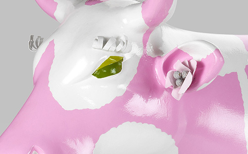 Pink cow with white flowers close-up