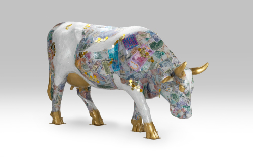 Cow covered in various currency facing right