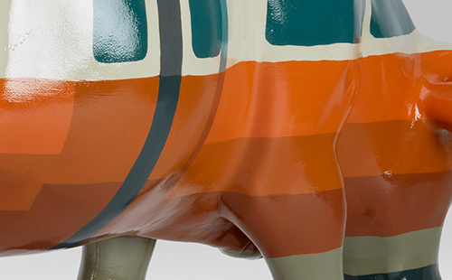 Cow designed like the MBTA orange line close-up