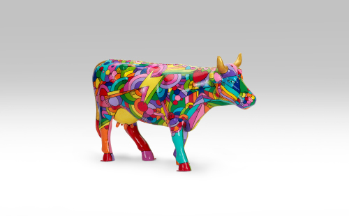 Colorful mini cow facing right