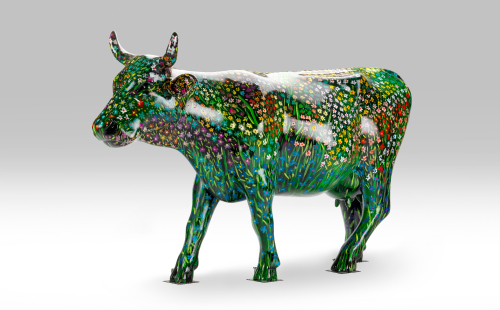 Flower covered cow facing left
