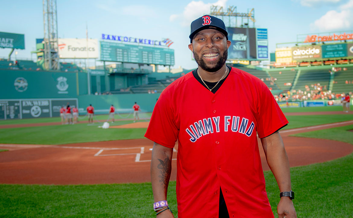 A Dana-Farber patient takes the field at Fenway Park