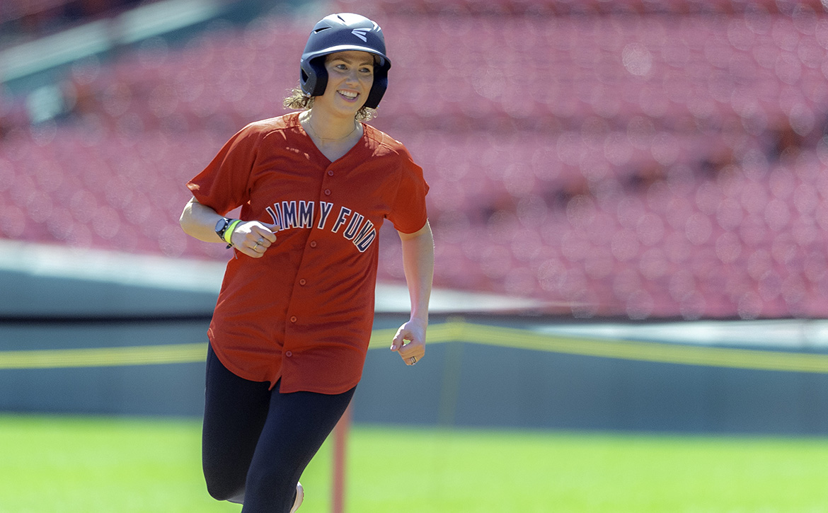 A Jimmy Fund Day participant running the bases at Fenway Park