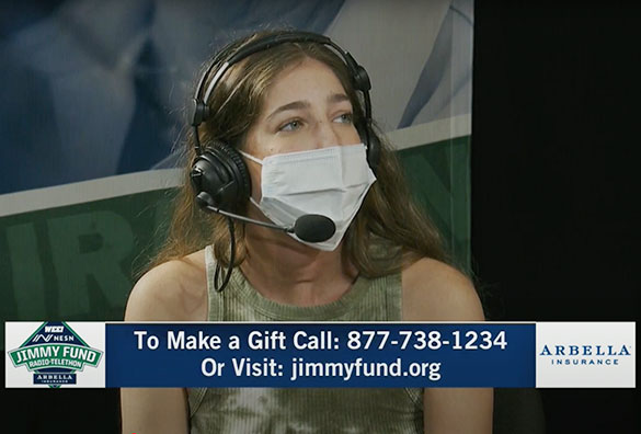 Frame from 2021 WEEI/NESN Jimmy Fund Radio Telethon recap video featuring Abbey and Dr. Hanna