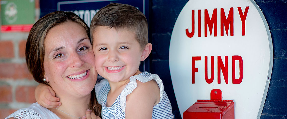 A Dana-Farber Jimmy Fund Clinic patient and her mom at Fenway Park