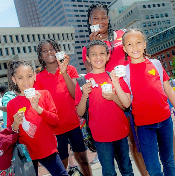 Scooper Bowl participants pose for a photo with some ice cream