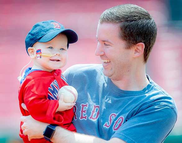 Dana-Farber Jimmy Fund clinic patient, William, at Fenway Fantasy Day with his dad